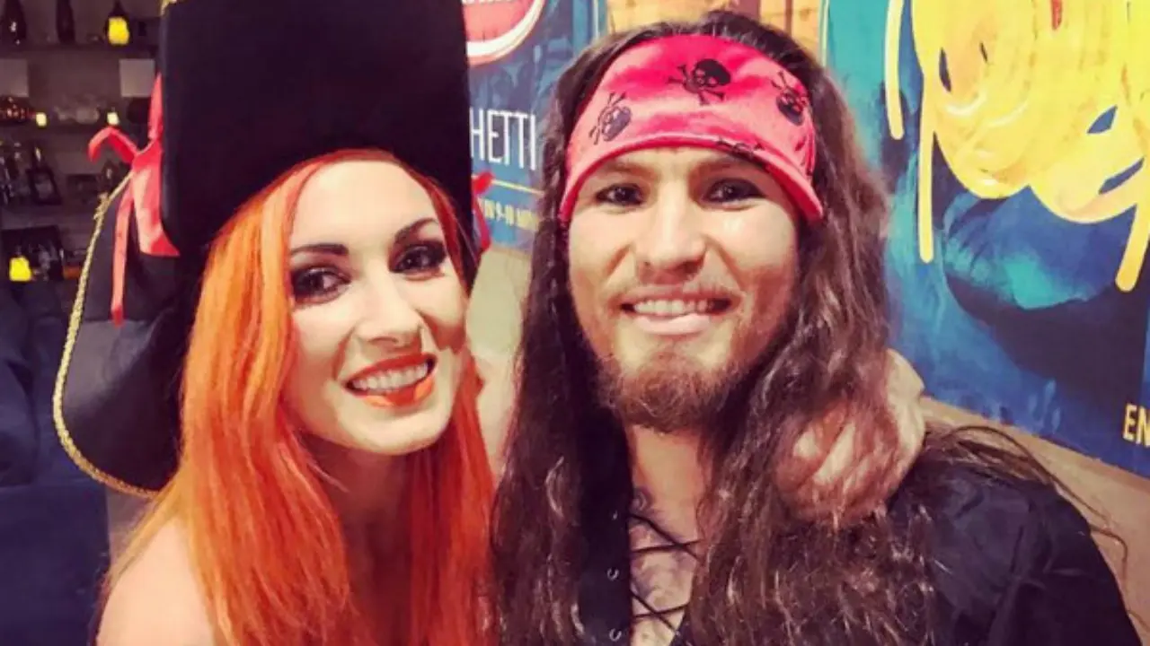 Luke Sanders with his spouse Becky Lynch