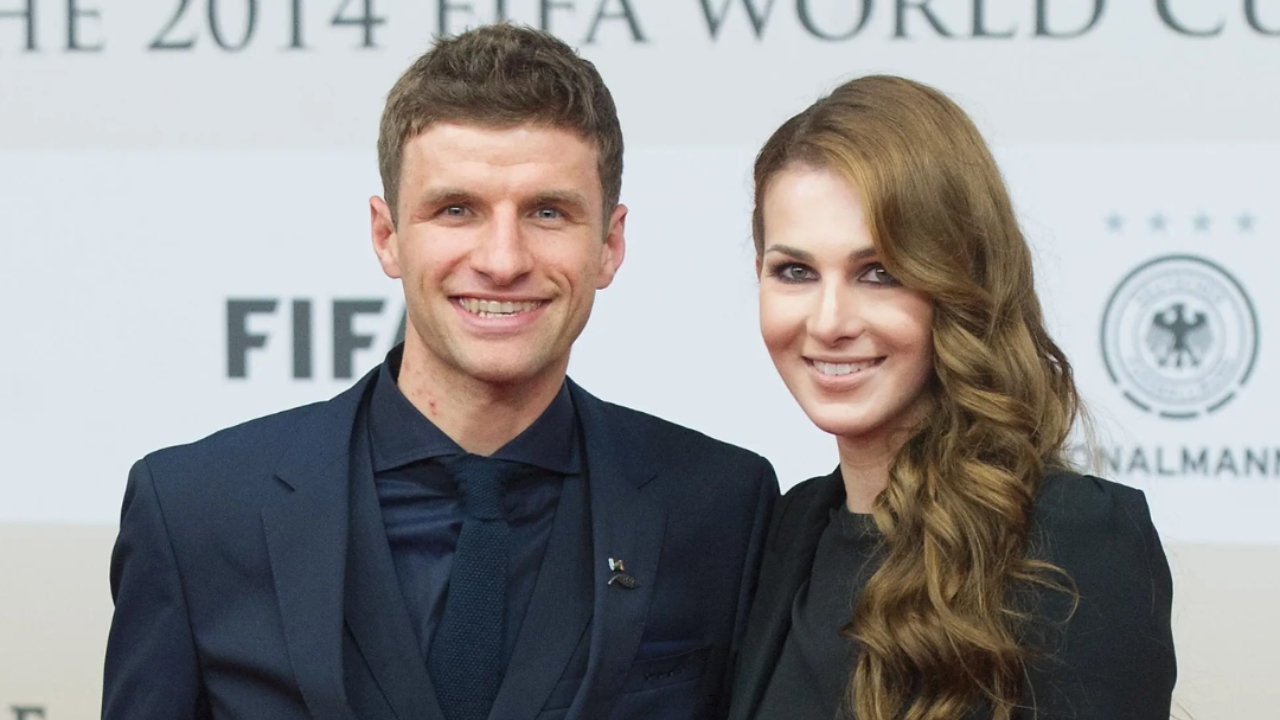 Thomas Muller with his wife Lisa Trede