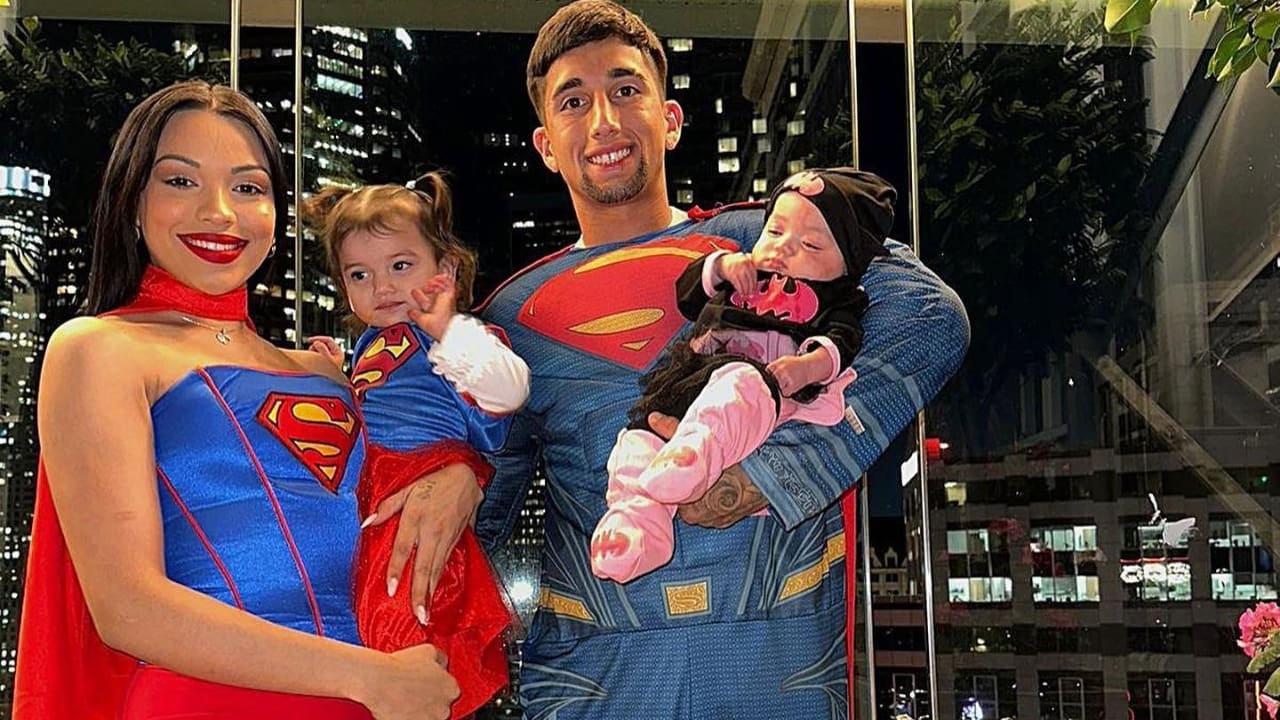 Cristian Olivera with his girlfriend and child