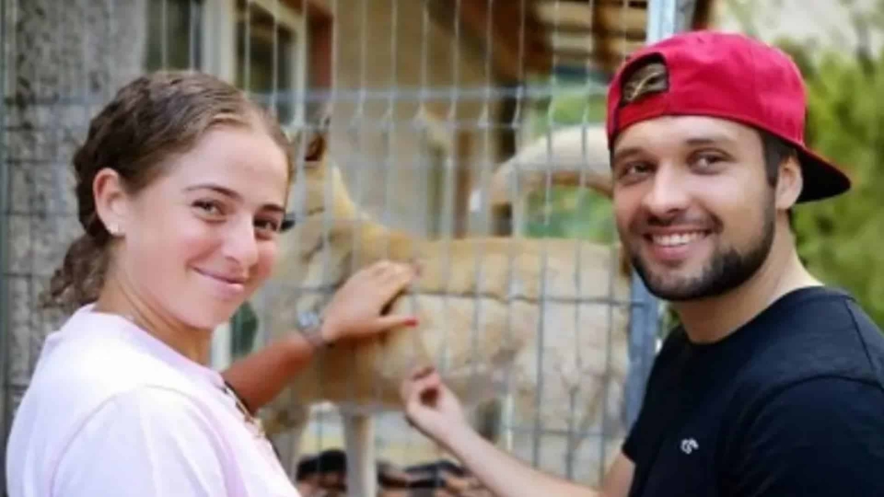 Arthurs Karasausks with his girlfriend Jelena Ostapenko
