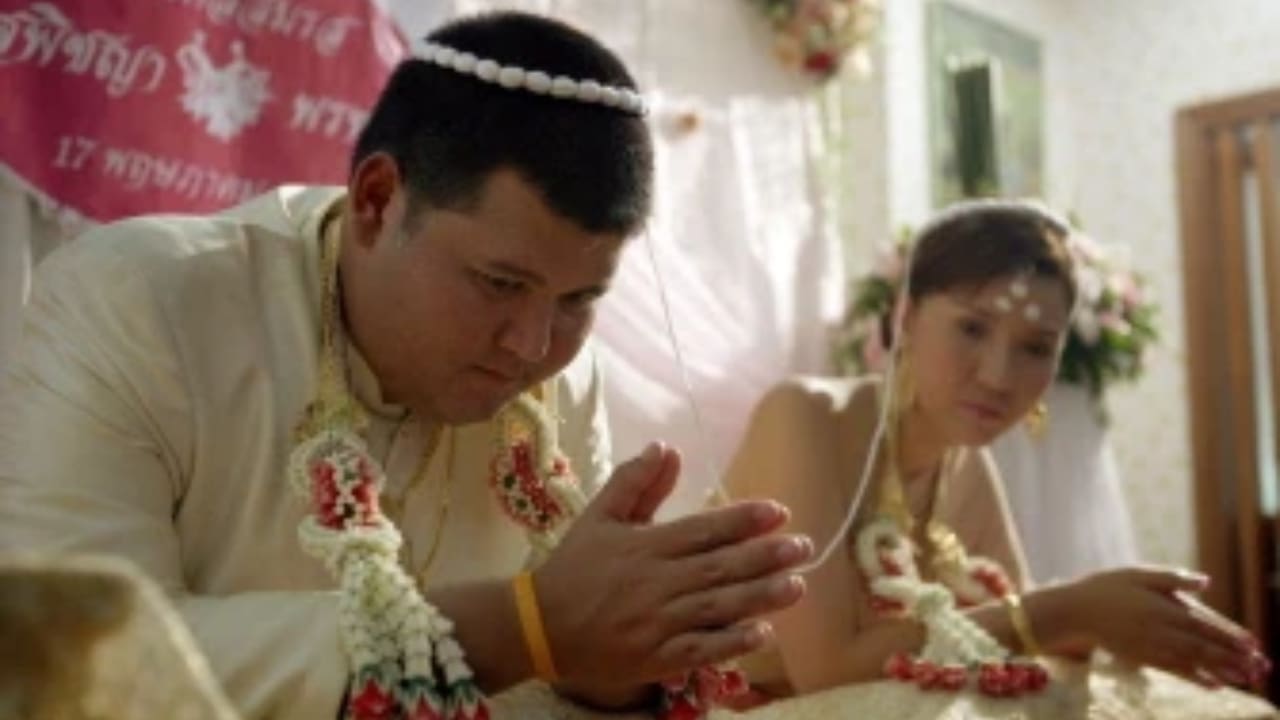Prom Meesawat with his wife Supichaya Panyathep