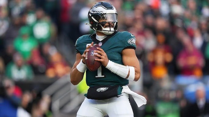 Jalen Hurts with a Football