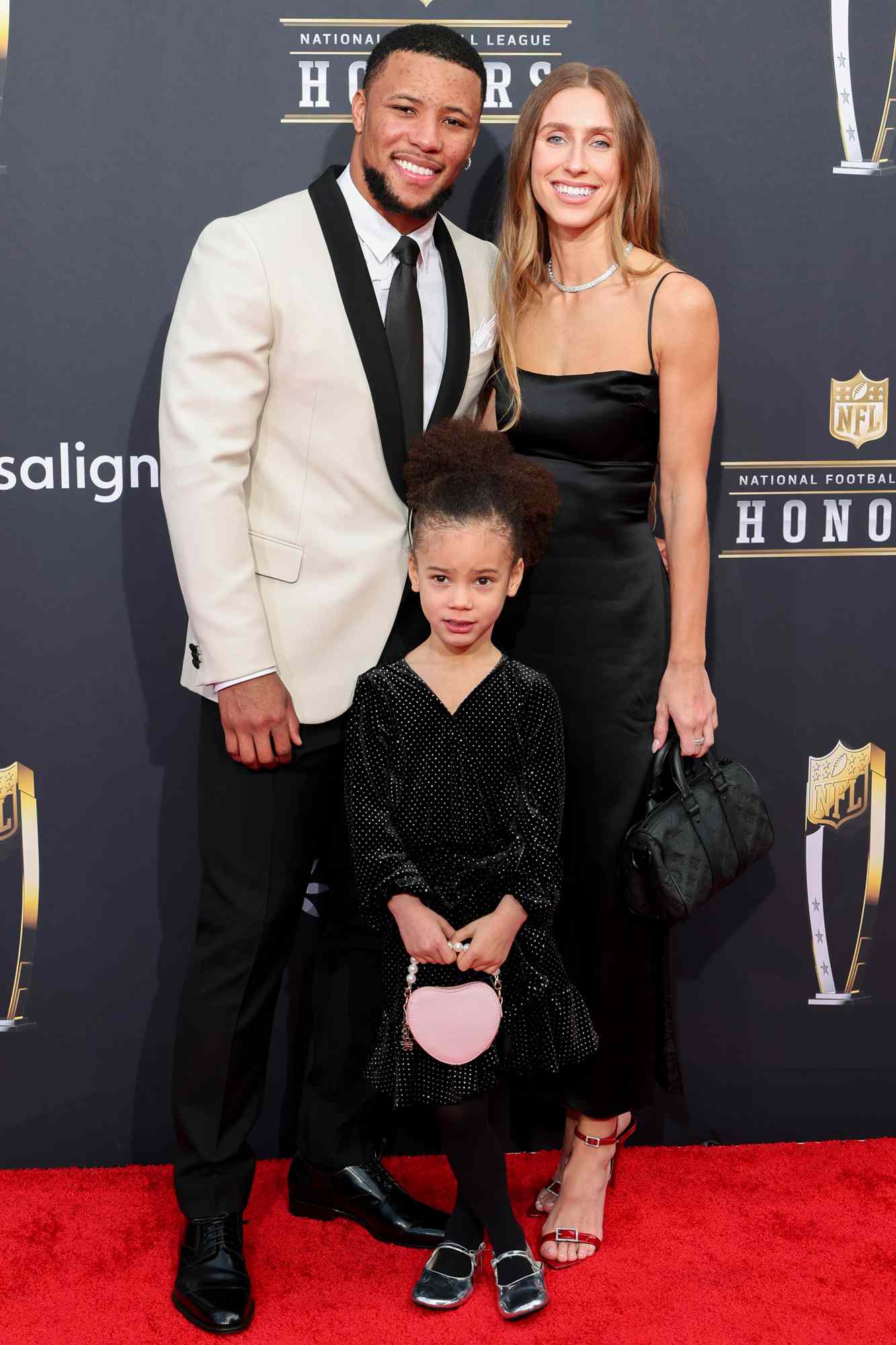 Saquon Barkley with Anna Congdon and Jada Clare Barkley