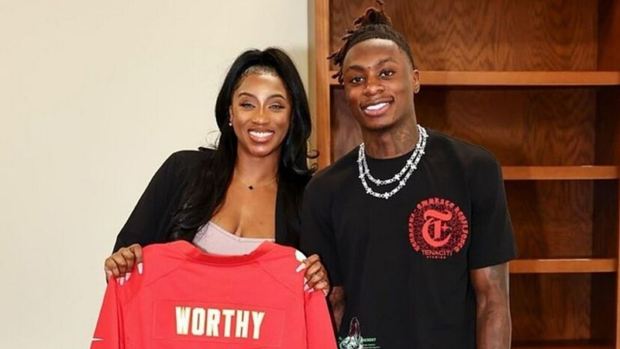 xavier worthy with his wife