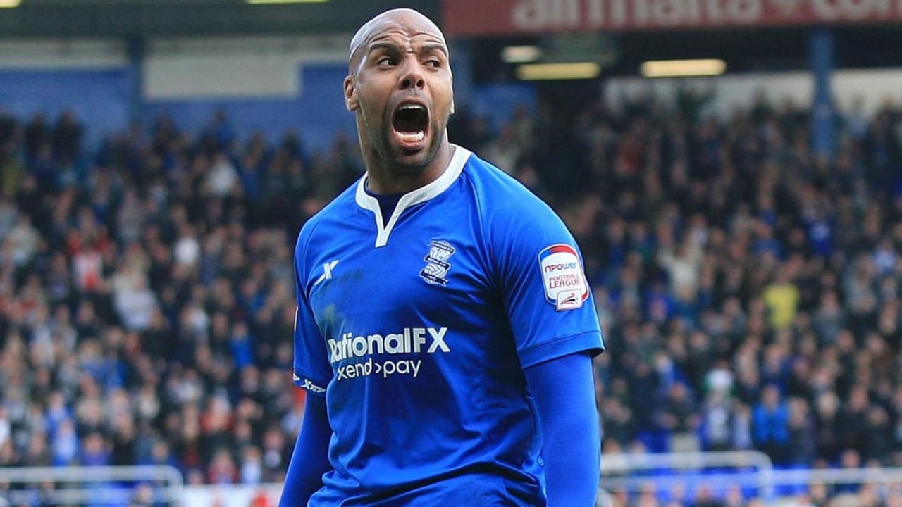 Marlon king in blue jersey.
