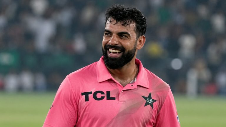 Haris Rauf wearing Pakistan’s pink cricket shirt with TCL branding and the Pakistan star crest.